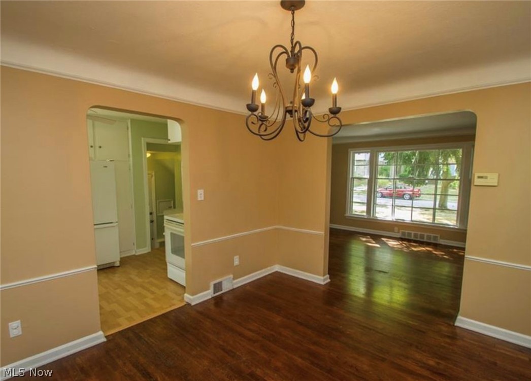 3563 Woodridge Road Cleveland Heights, OH 44121 - Photo 8 of 20 The Dining Room with hardwood floor and cove ceiling