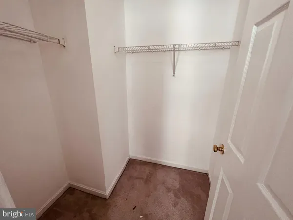 a view of small space with racks on the wall