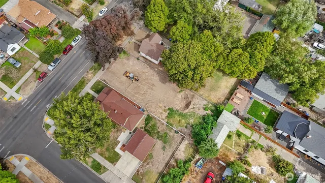 an aerial view of house with yard