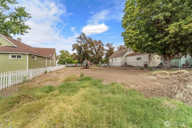 an aerial view of a houses with outdoor space