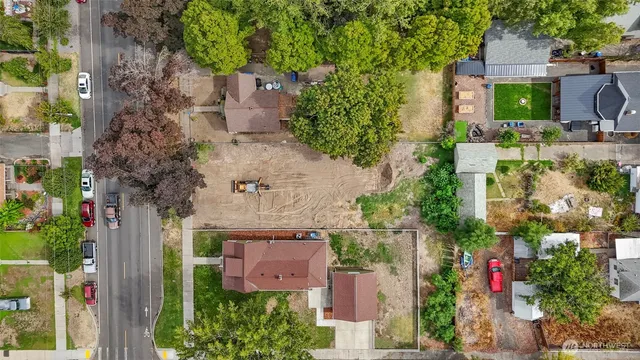 an aerial view of residential house with outdoor space