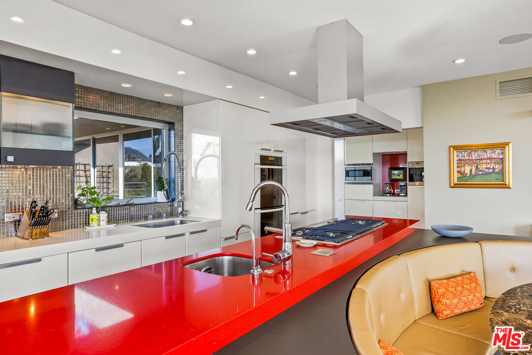 5693 Holly Oak Drive Los Angeles, CA 90068 - Photo 6 of 26 a room with furniture and view of kitchen