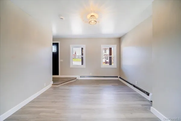 a kitchen with a stove and a microwave