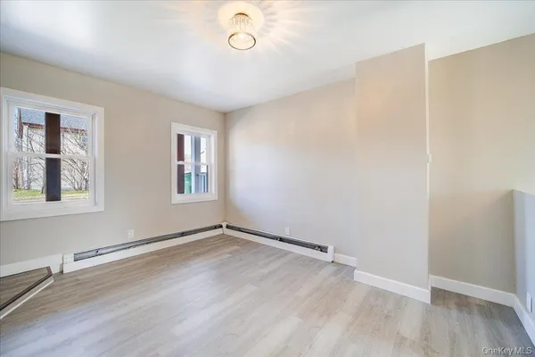 a kitchen with stainless steel appliances granite countertop a sink stove and oven