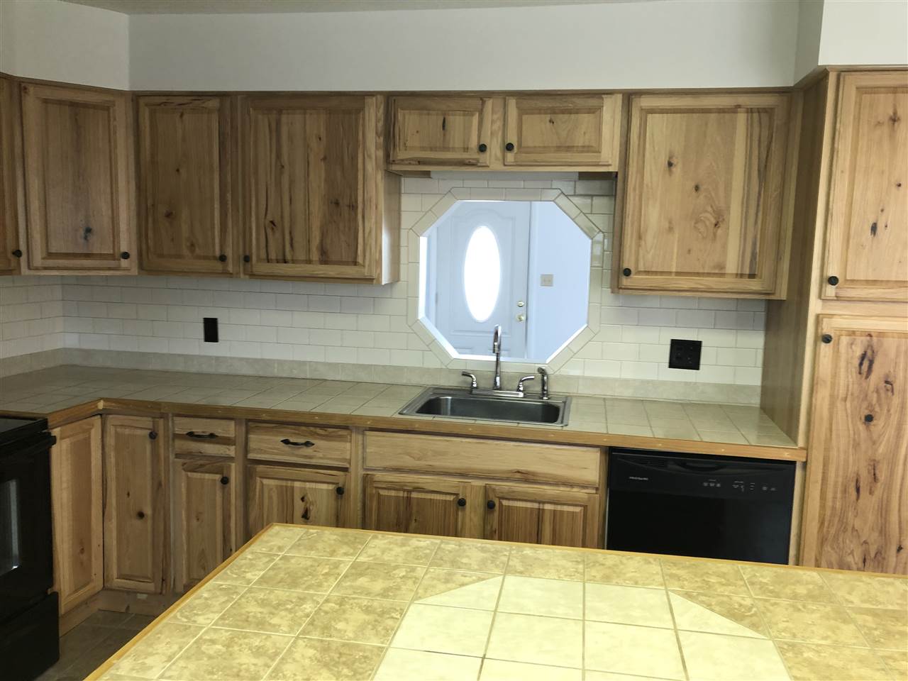 8 Christine Road Lyndhurst, VA 22952 - Photo 9 of 13 a kitchen with stainless steel appliances granite countertop a sink and cabinets