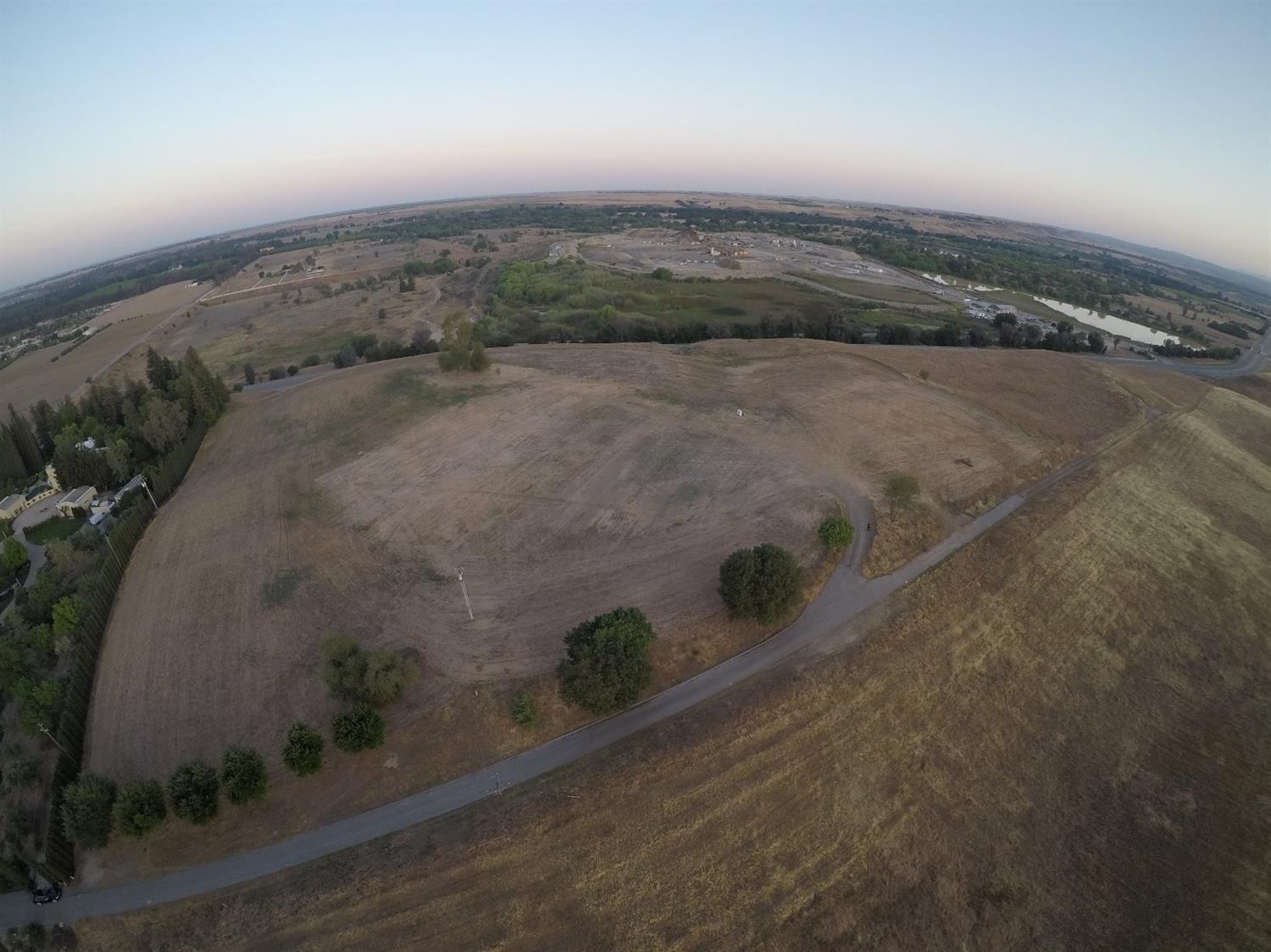 13152 Willow Bluff Clovis, CA 93619 - Photo 4 of 10 an aerial view of a residential houses with outdoor space