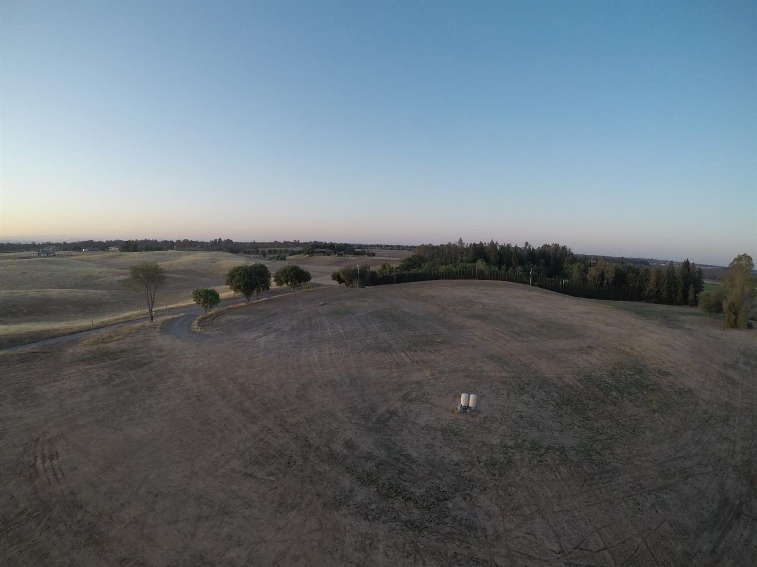 13152 Willow Bluff Clovis, CA 93619 - Photo 6 of 10 a view of a field with trees in background
