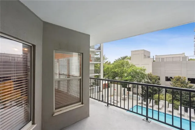a view of a balcony with an outdoor space