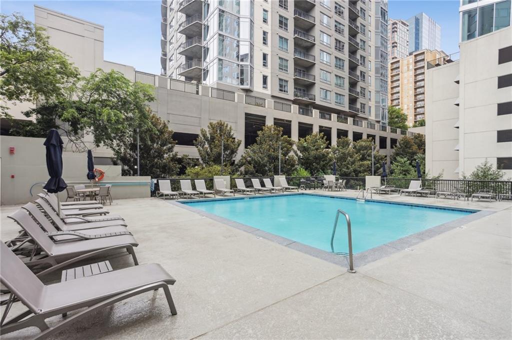 275 13th Street Northeast, Unit 312 Atlanta, GA 30309 - Photo 23 of 31 a view of a building with garden