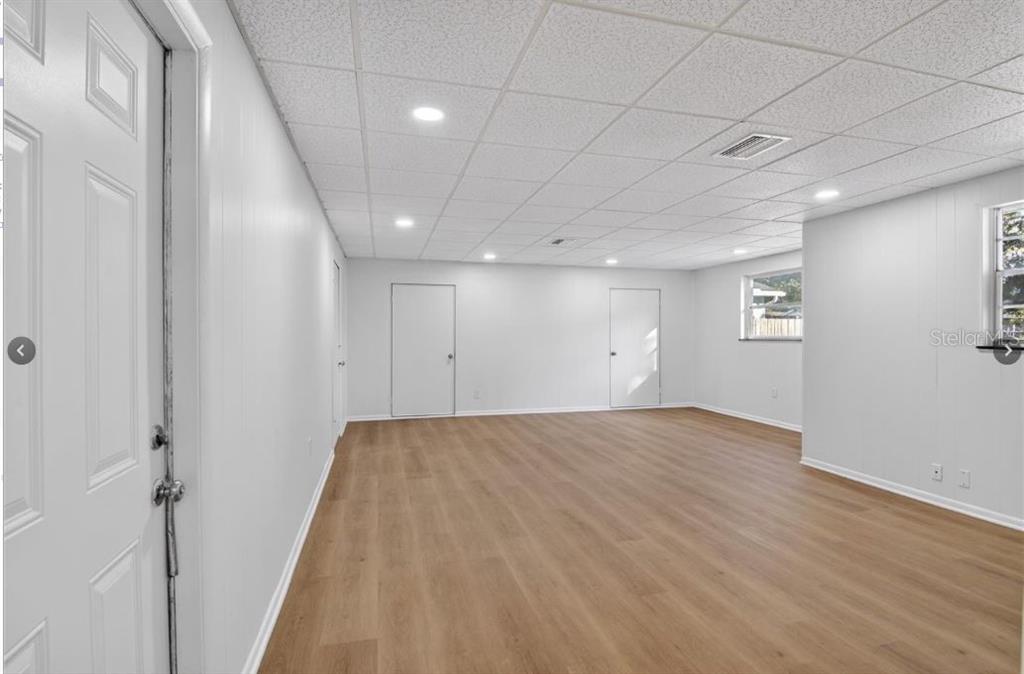 613 Marshall Street Altamonte Springs, FL 32701 - Photo 5 of 10 a view of empty room with wooden floor