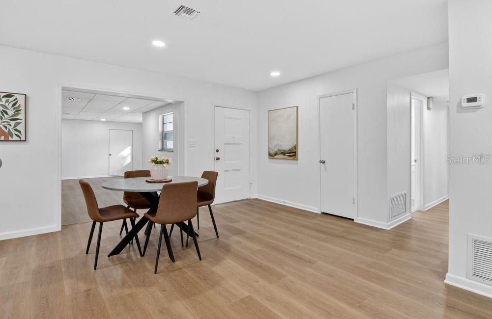 613 Marshall Street Altamonte Springs, FL 32701 - Photo 9 of 10 a view of a dining room with furniture and wooden floor