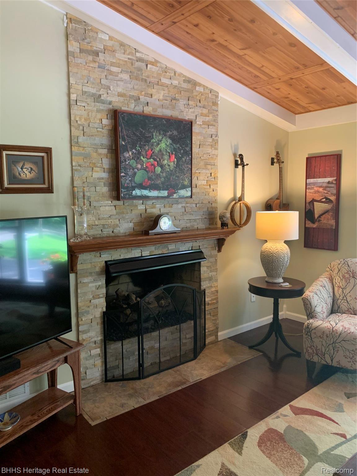 2413 Hunter Road Brighton, MI 48114 - Photo 10 of 42 BEAUTIFUL BRICK GAS FIRELPLACE IN LIVINGROOM