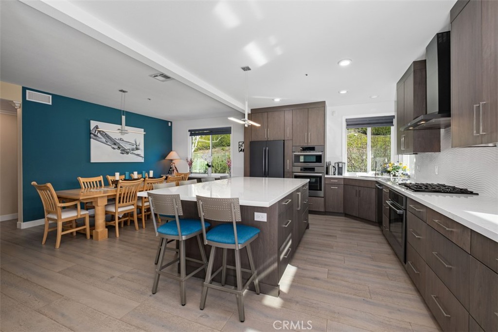 2 Field Point Rancho Santa Margarita, CA 92679 - Photo 6 of 23 Kitchen everything a cook could want -All Bosch appliances, large island and tons of storage (pull outs and cabinets. Multiple views from kitchen