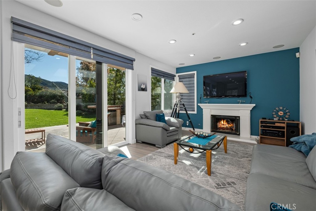 2 Field Point Rancho Santa Margarita, CA 92679 - Photo 9 of 23 Family room, fire place, speakers, Circadian Lighting system - And check out the view!