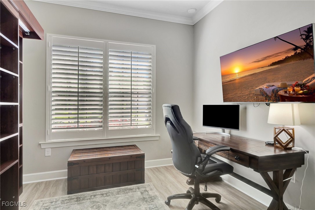 11716 Avingston Terrace Fort Myers, FL 33913 - Photo 15 of 49 a view of a workspace with furniture and a window