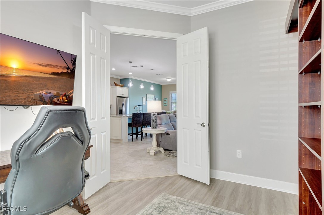 11716 Avingston Terrace Fort Myers, FL 33913 - Photo 17 of 49 a living room with furniture and a flat screen tv