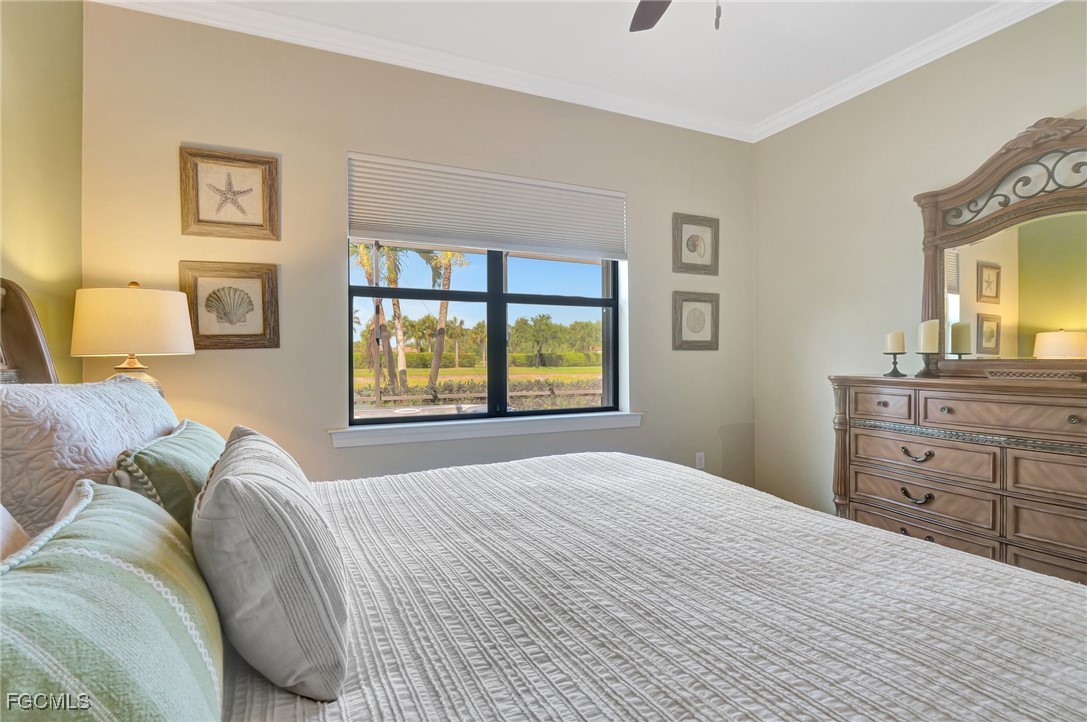11716 Avingston Terrace Fort Myers, FL 33913 - Photo 20 of 49 a bedroom with a bed and a dresser