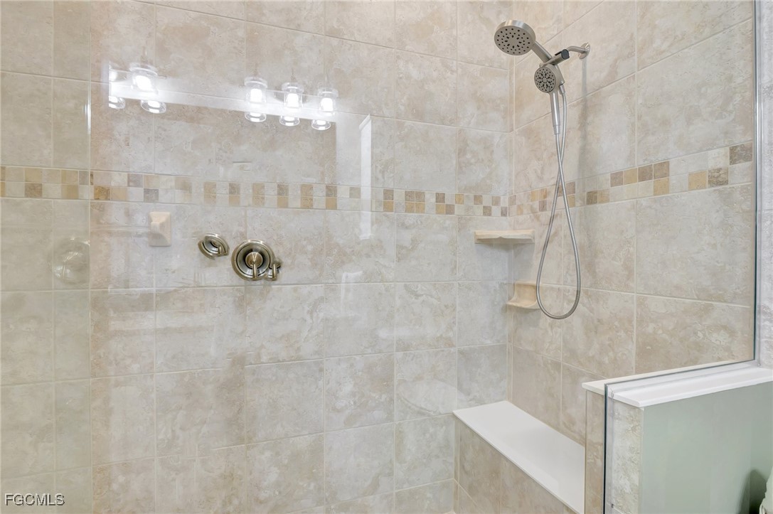 11716 Avingston Terrace Fort Myers, FL 33913 - Photo 22 of 49 a bathroom with a shower
