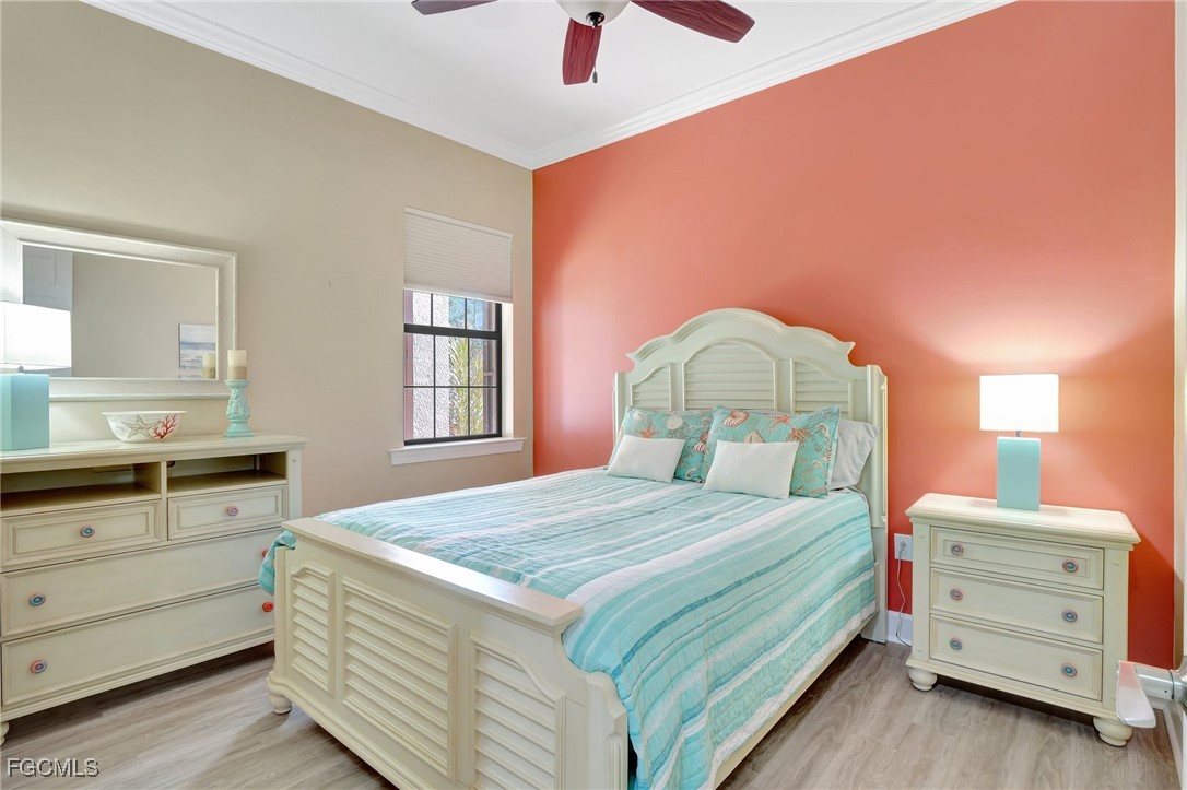 11716 Avingston Terrace Fort Myers, FL 33913 - Photo 23 of 49 a bedroom with a bed and a dresser