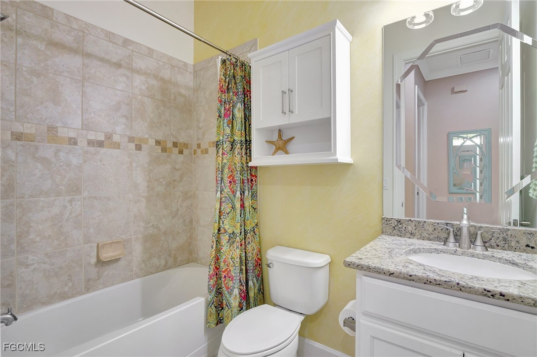 11716 Avingston Terrace Fort Myers, FL 33913 - Photo 25 of 49 a bathroom with a granite countertop toilet sink and shower