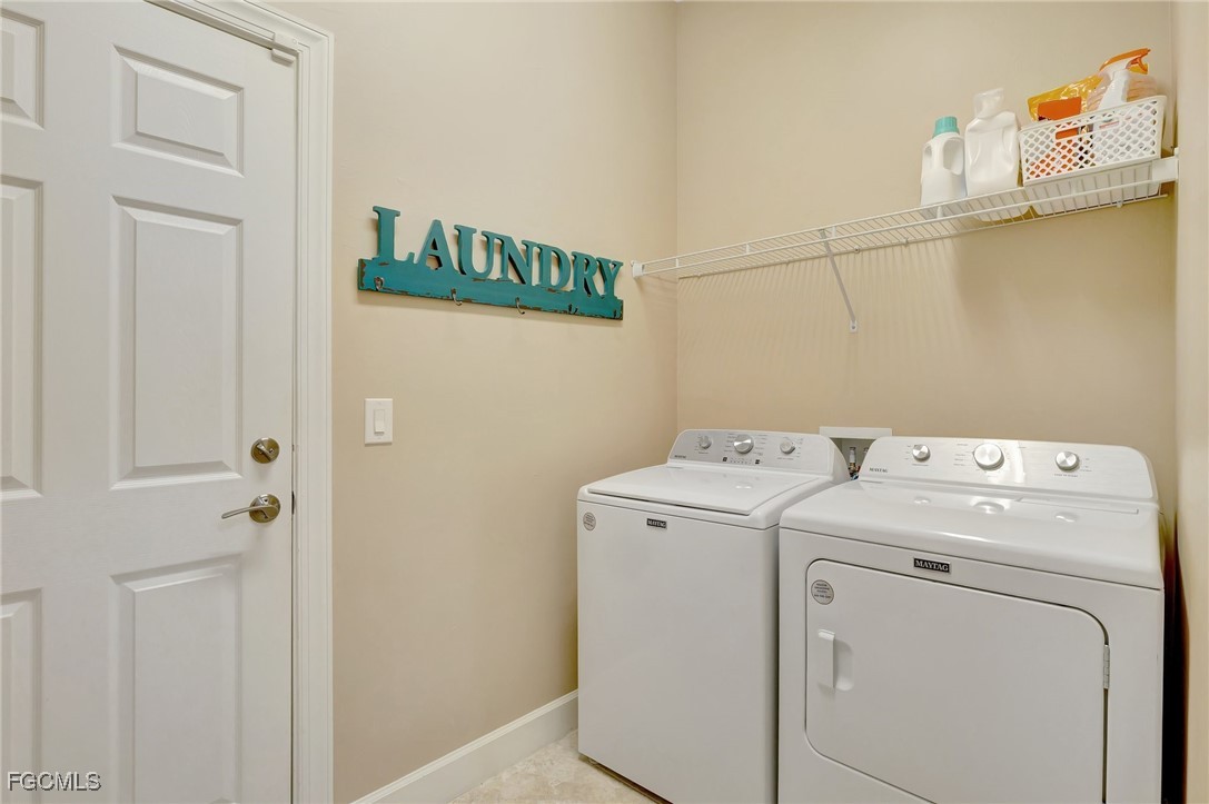 11716 Avingston Terrace Fort Myers, FL 33913 - Photo 26 of 49 a utility room with dryer and washer