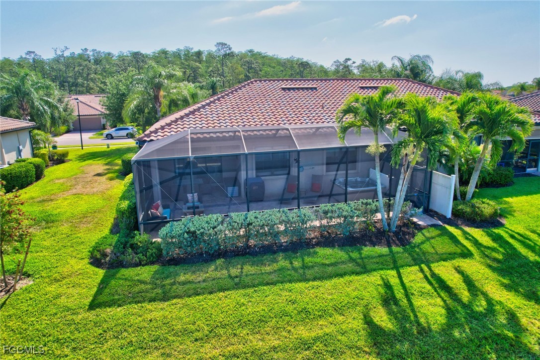 11716 Avingston Terrace Fort Myers, FL 33913 - Photo 33 of 49 a view of a backyard with a garden