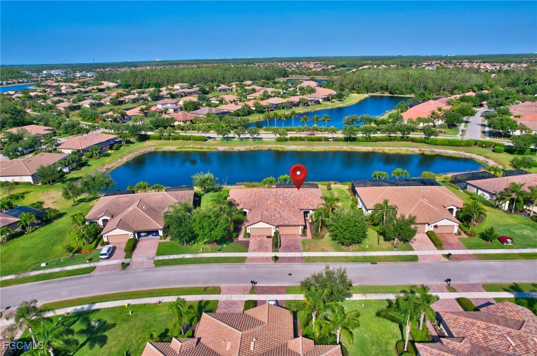 11716 Avingston Terrace Fort Myers, FL 33913 - Photo 37 of 49 an aerial view of residential houses with outdoor space and swimming pool