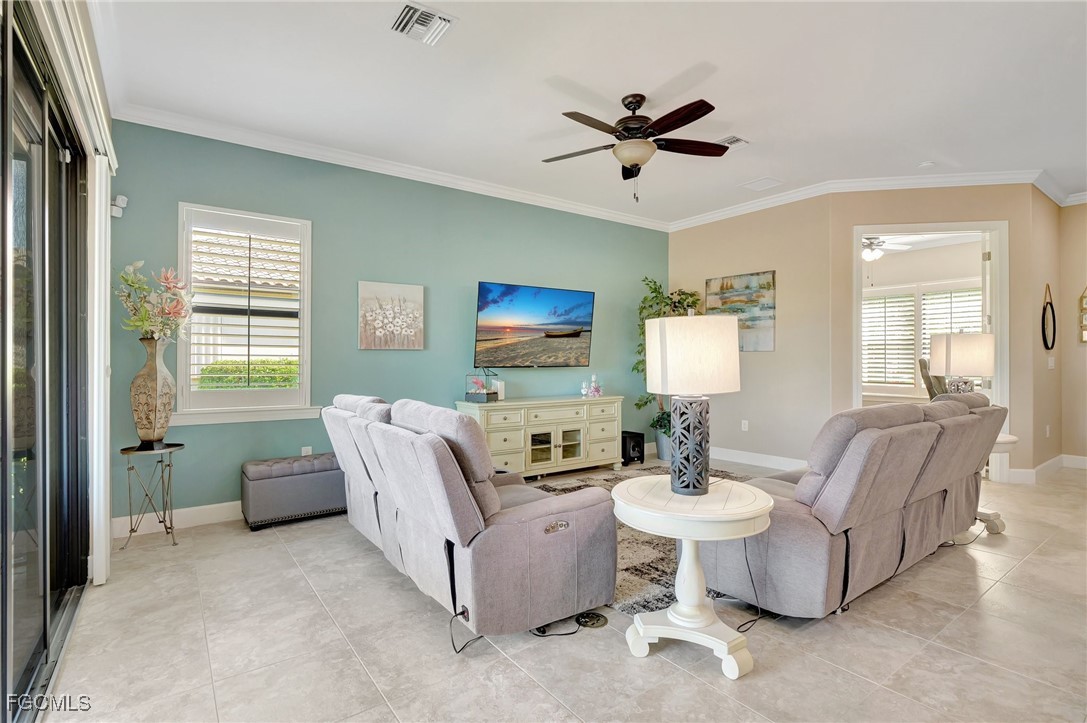 11716 Avingston Terrace Fort Myers, FL 33913 - Photo 5 of 49 a living room with furniture and a window