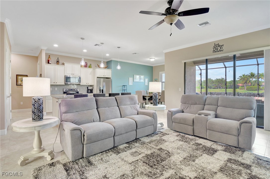 11716 Avingston Terrace Fort Myers, FL 33913 - Photo 6 of 49 a living room with furniture and a large window