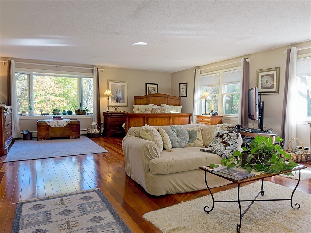 101 Bellevue Road Andover, MA 01810 - Photo 17 of 39 a living room with furniture and a fireplace
