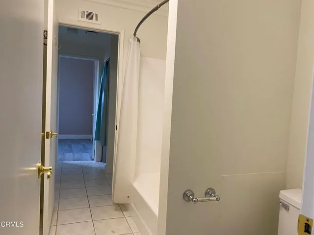 a bathroom with a sink and toilet