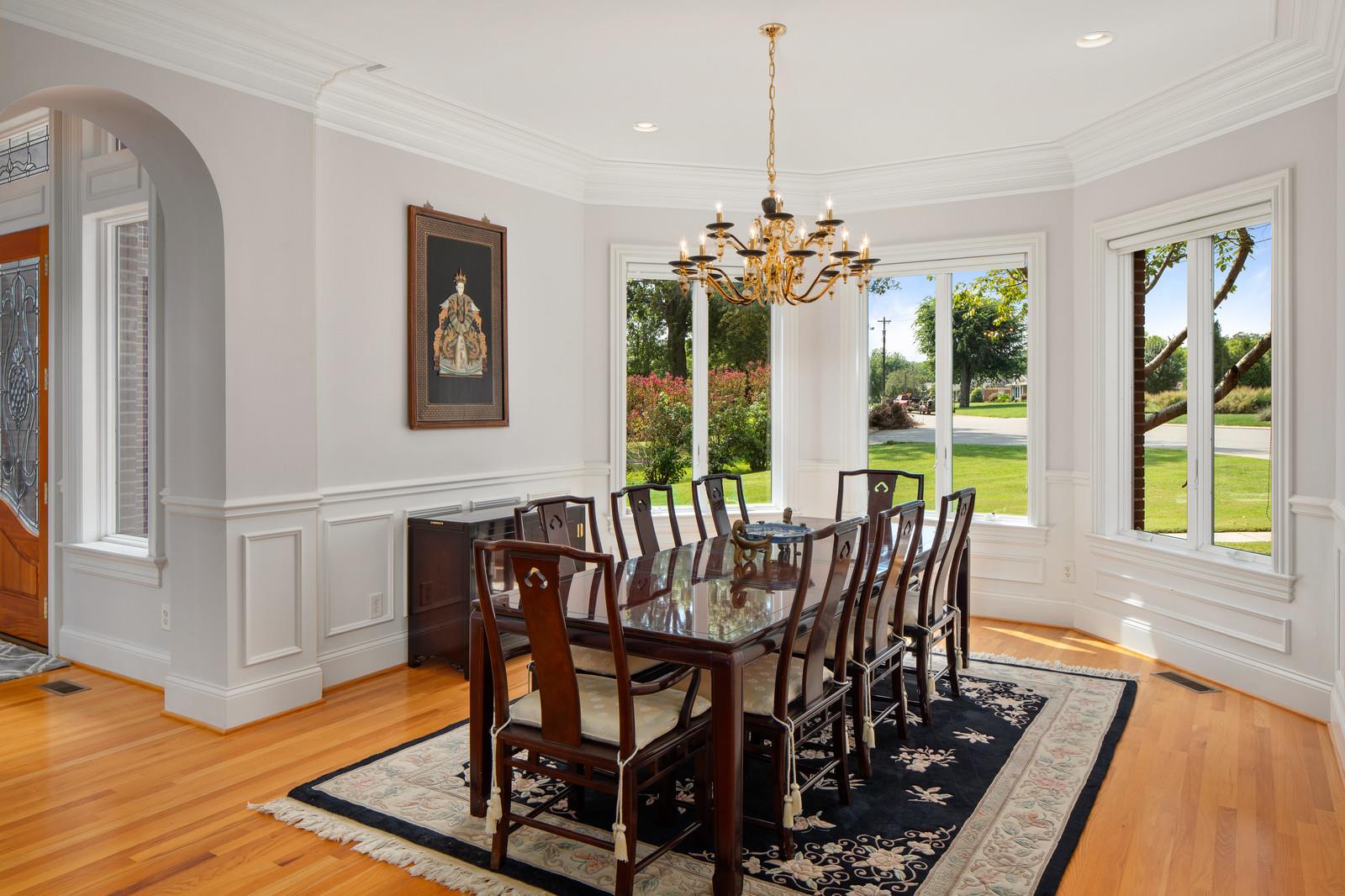 101 Rolling Mill Road Old Hickory, TN 37138 - Photo 8 of 30 This large formal dining room is the perfect place to gather for large family get togethers. Wainscoting and abundant natural light provided from the bay windows.