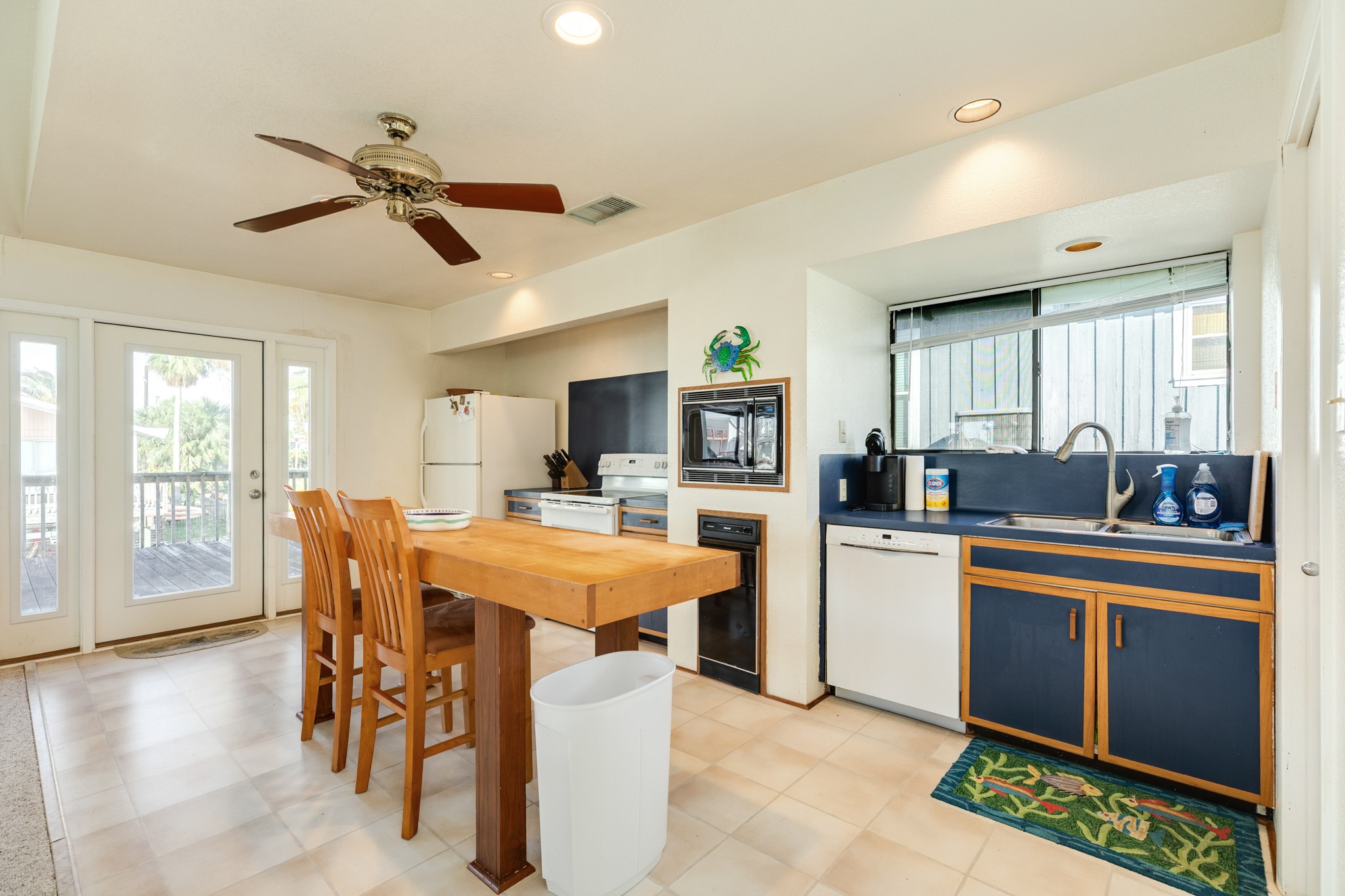 16708 Cormorant Road Jamaica Beach, TX 77554 - Photo 17 of 33 Front entryway and breakfast area/kitchen view