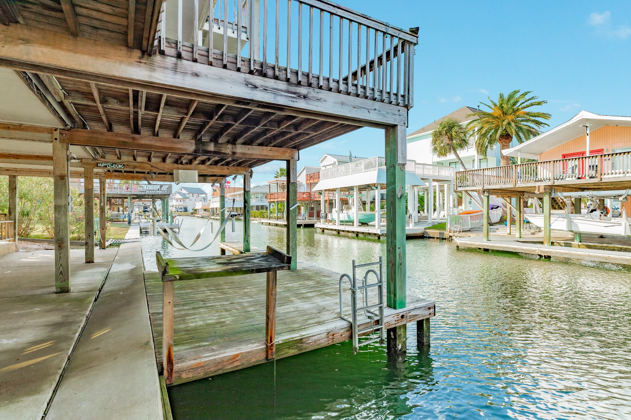 16708 Cormorant Road Jamaica Beach, TX 77554 - Photo 30 of 33 Boat slip with lift
