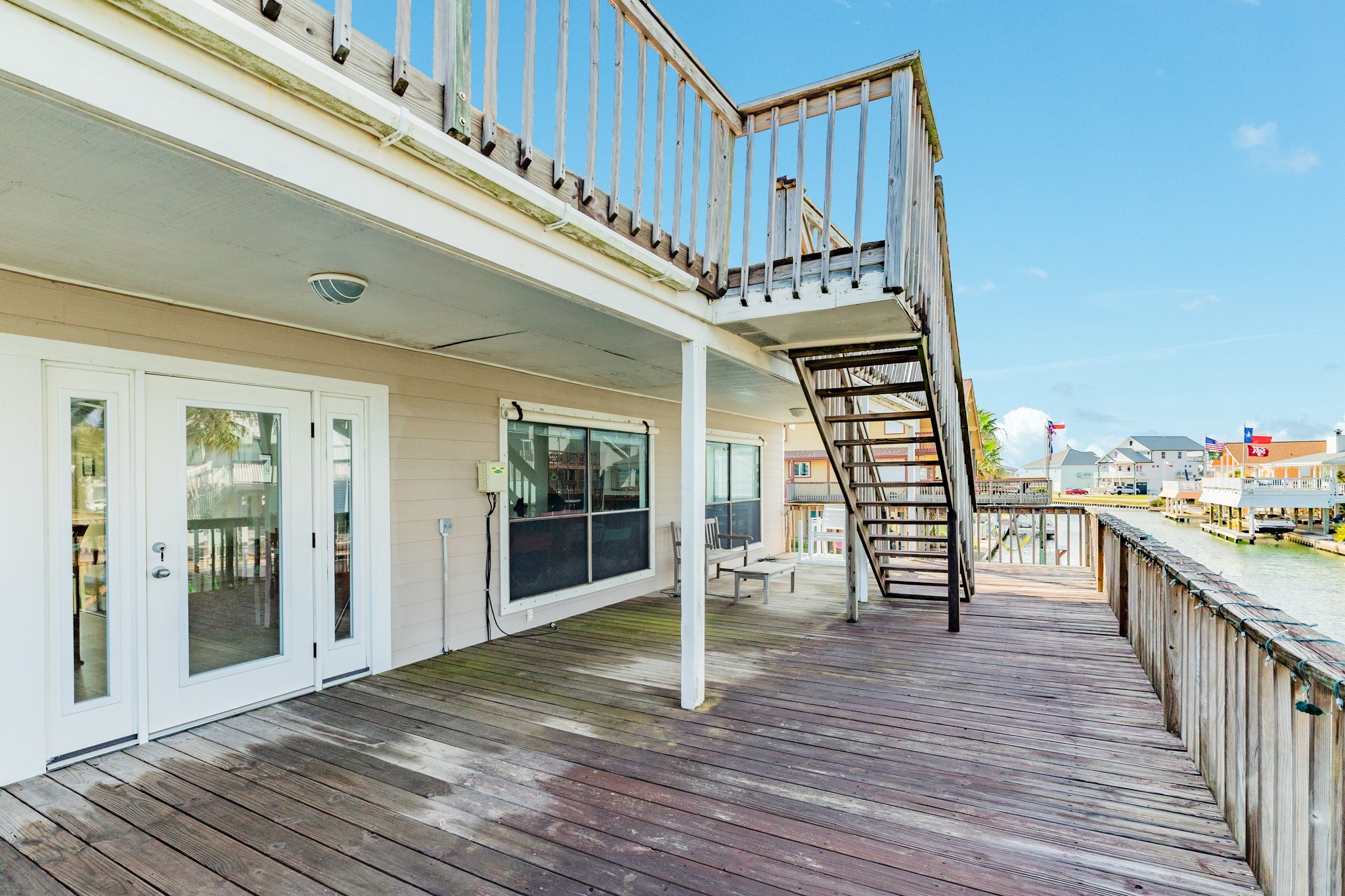 16708 Cormorant Road Jamaica Beach, TX 77554 - Photo 8 of 33 Main deck is large at 38' x 15".