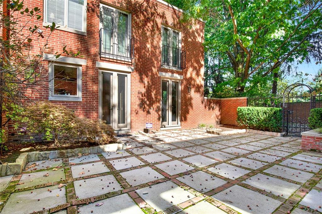222 Schenley Road Pittsburgh, PA 15217 - Photo 6 of 40 The patio also features a gated access to a side yard—ideal for pet owners.