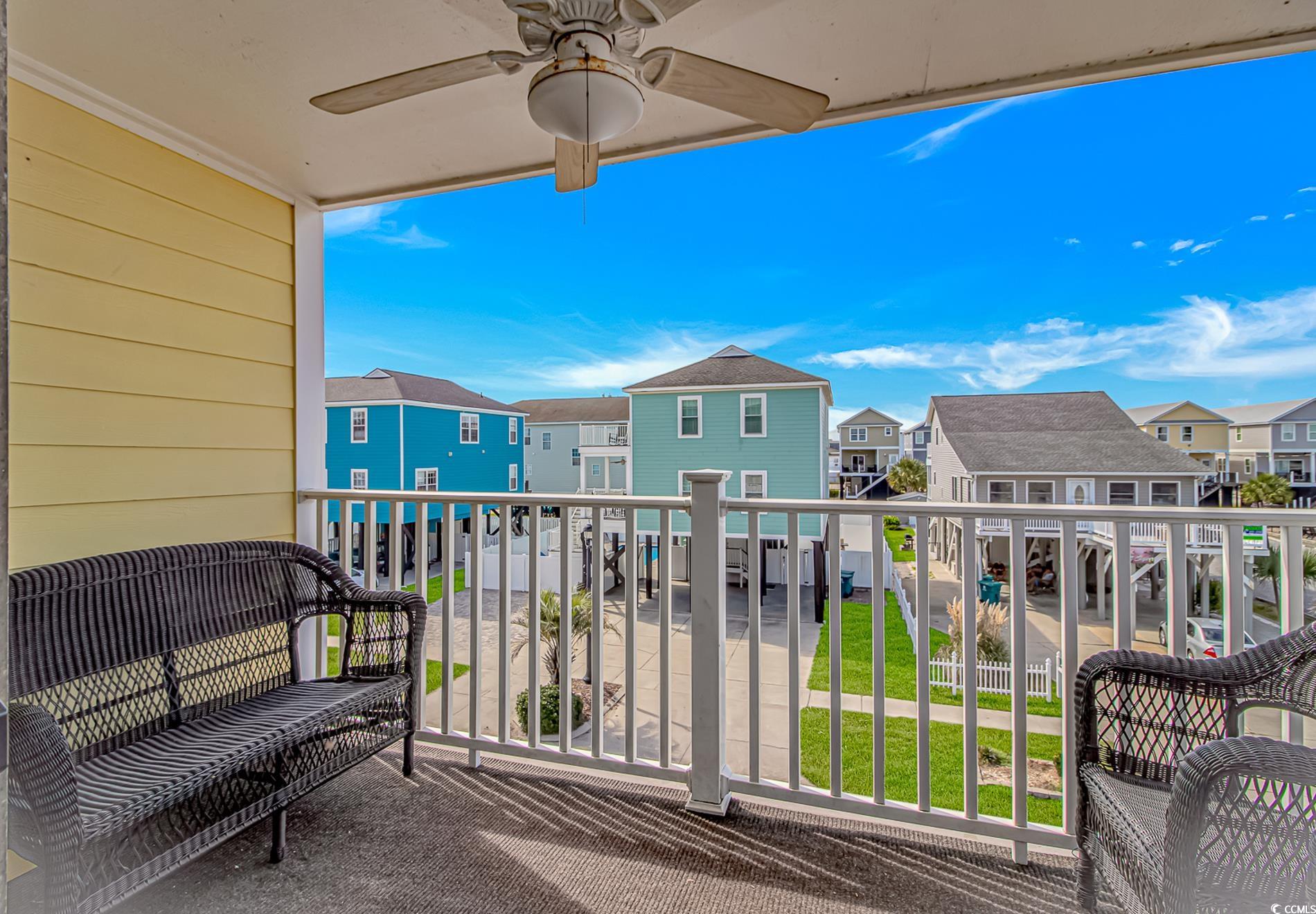 301 North Waccamaw Drive, Unit 211 Murrells Inlet, SC 29576 - Photo 13 of 37 Balcony featuring a ceiling fan