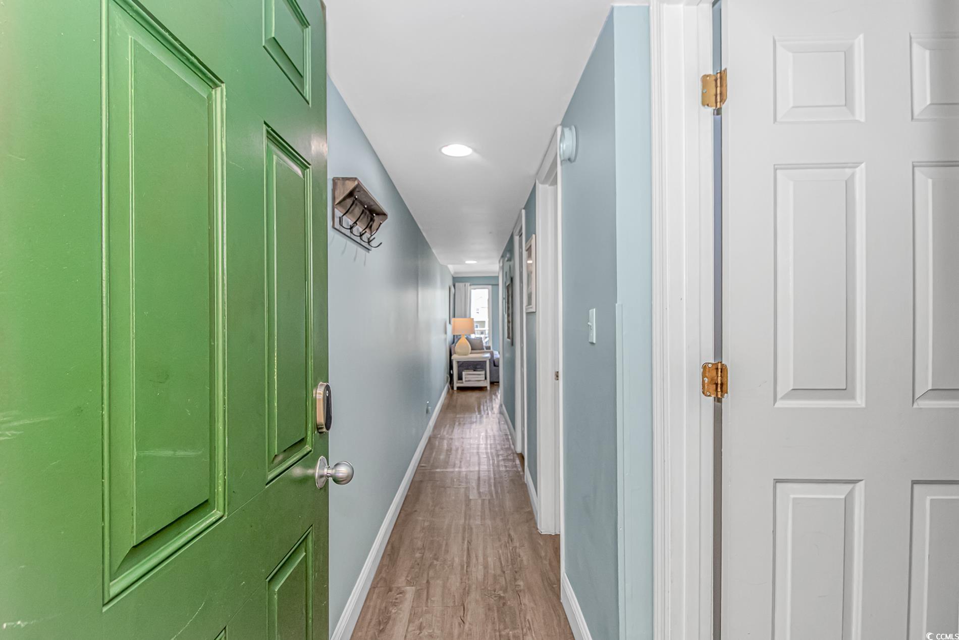 301 North Waccamaw Drive, Unit 211 Murrells Inlet, SC 29576 - Photo 2 of 37 Hall with light wood-style flooring and recessed lighting