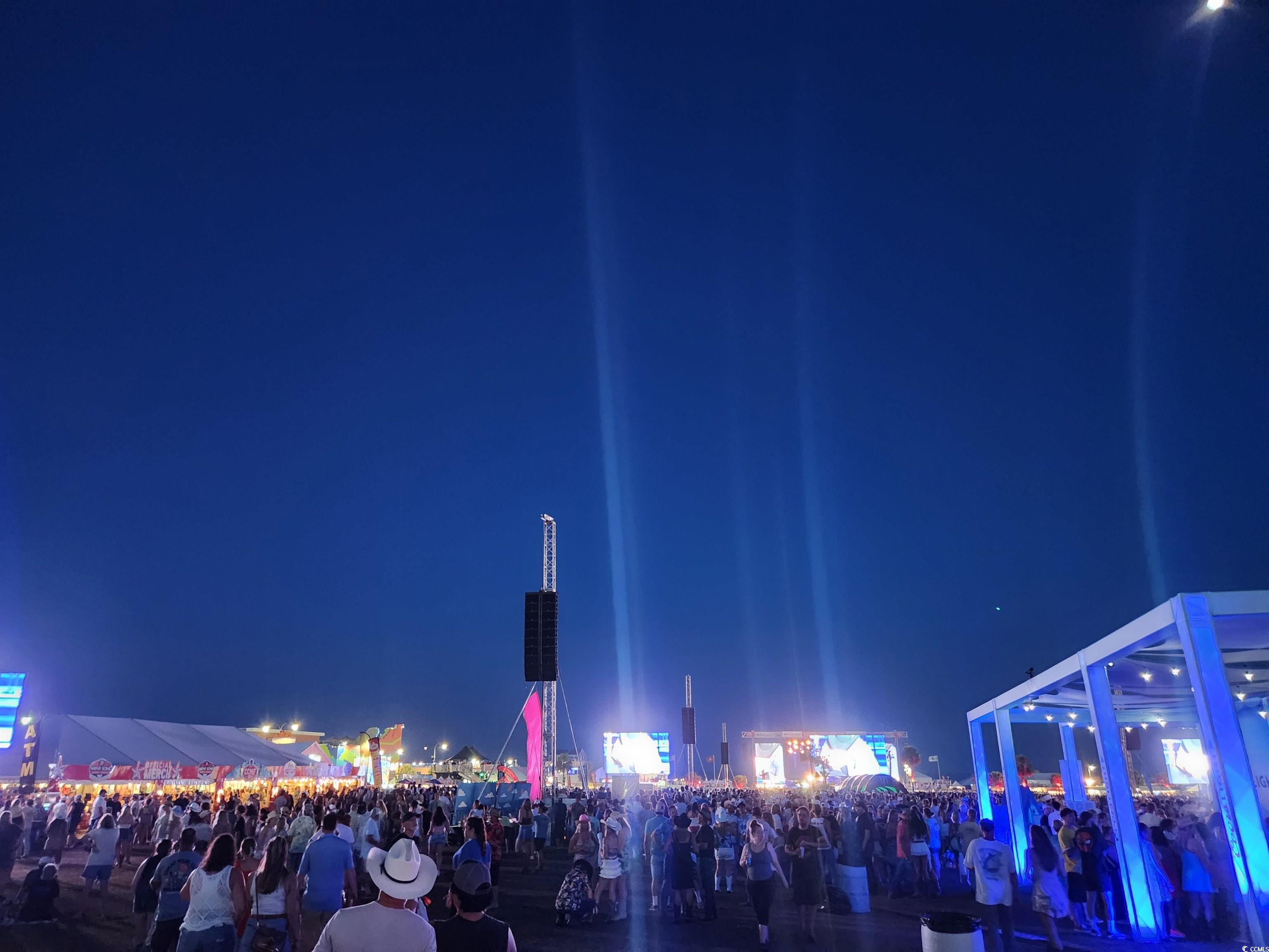 301 North Waccamaw Drive, Unit 211 Murrells Inlet, SC 29576 - Photo 26 of 37 View of property at twilight