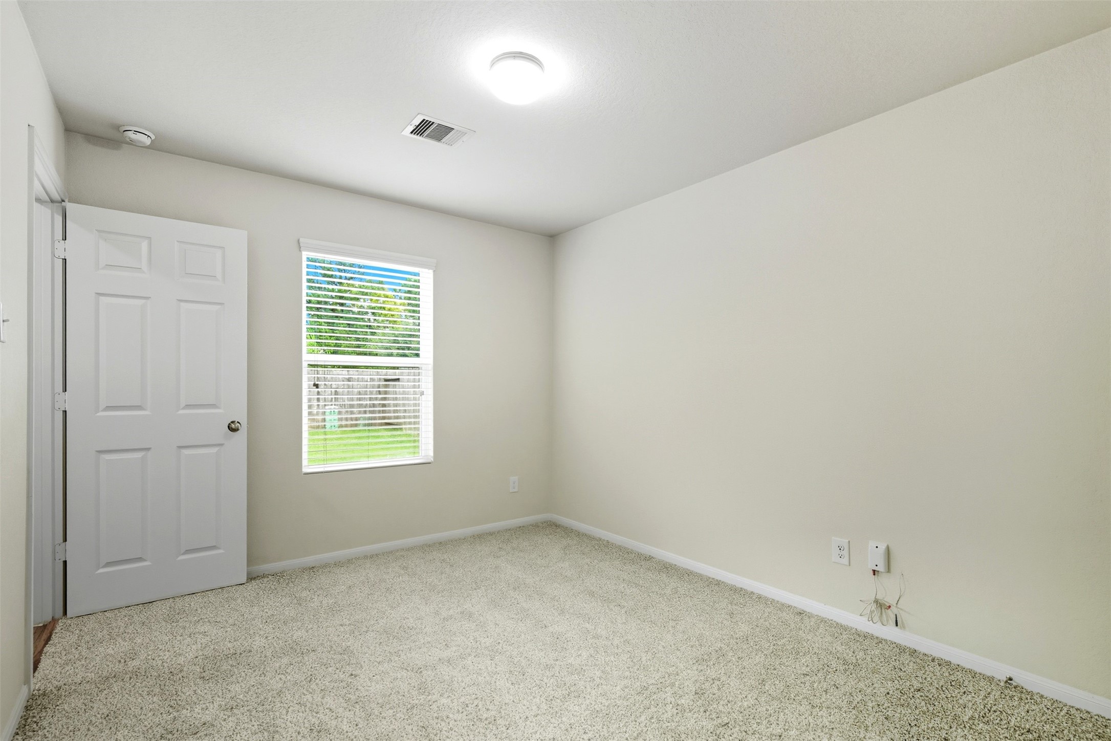 18414 West Hardy Road Houston, TX 77073 - Photo 13 of 46 an empty room with windows