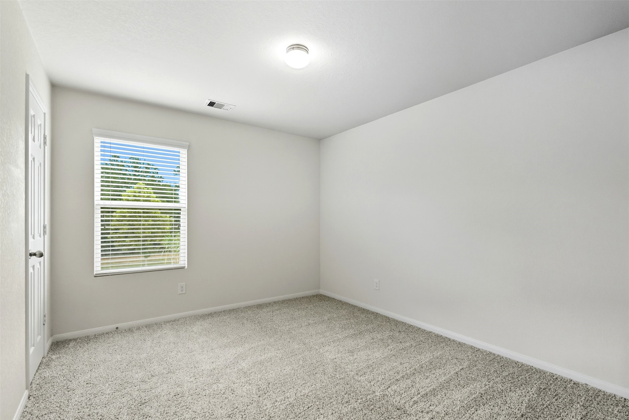 18414 West Hardy Road Houston, TX 77073 - Photo 15 of 46 an empty room with a window