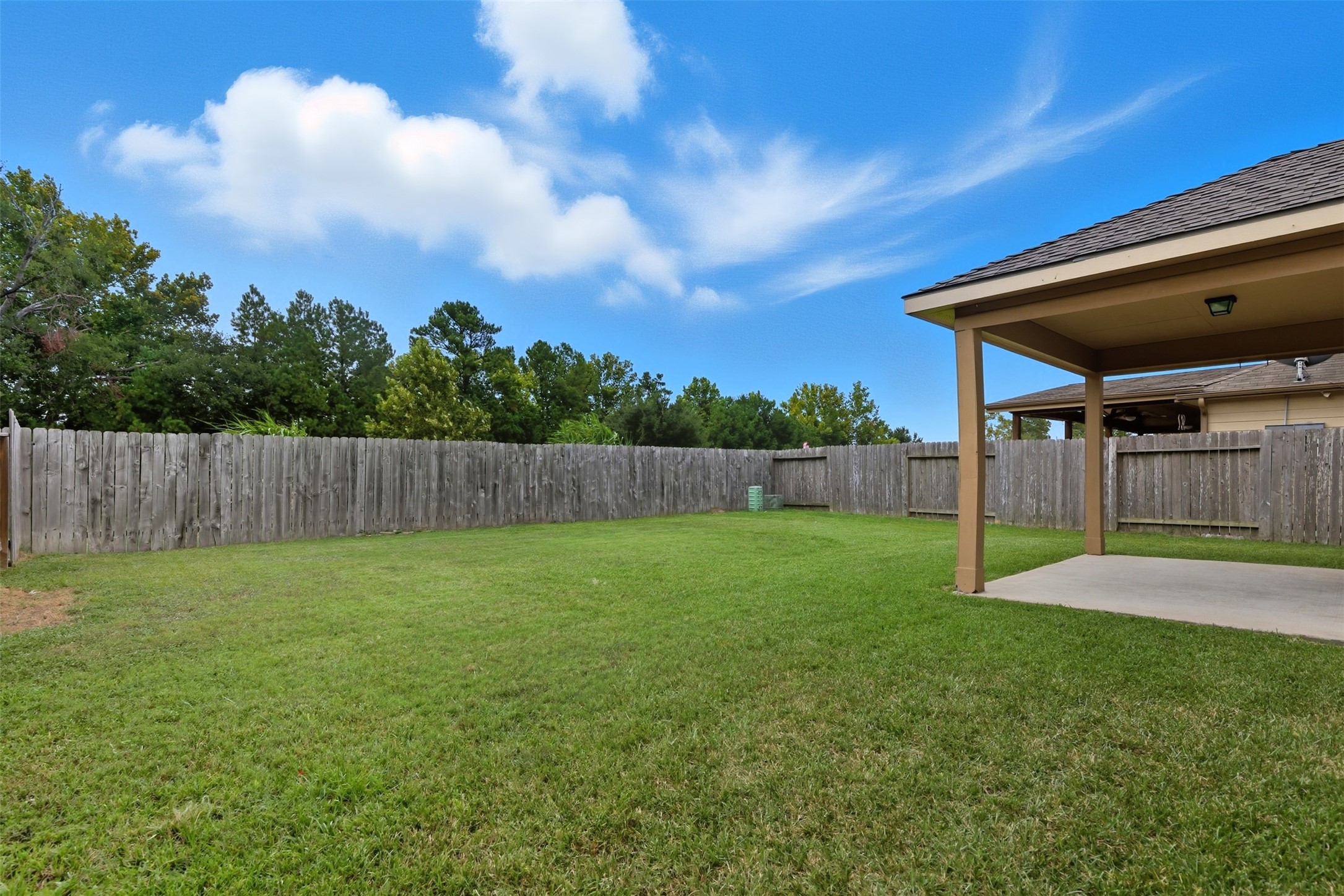 18414 West Hardy Road Houston, TX 77073 - Photo 34 of 46 a view of a backyard