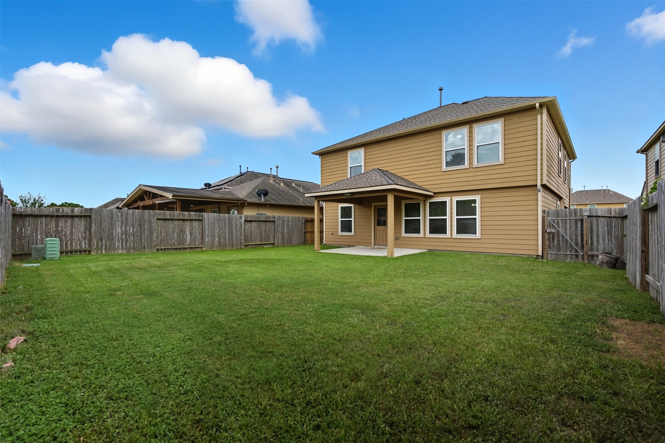 18414 West Hardy Road Houston, TX 77073 - Photo 35 of 46 a view of a house with backyard and garden