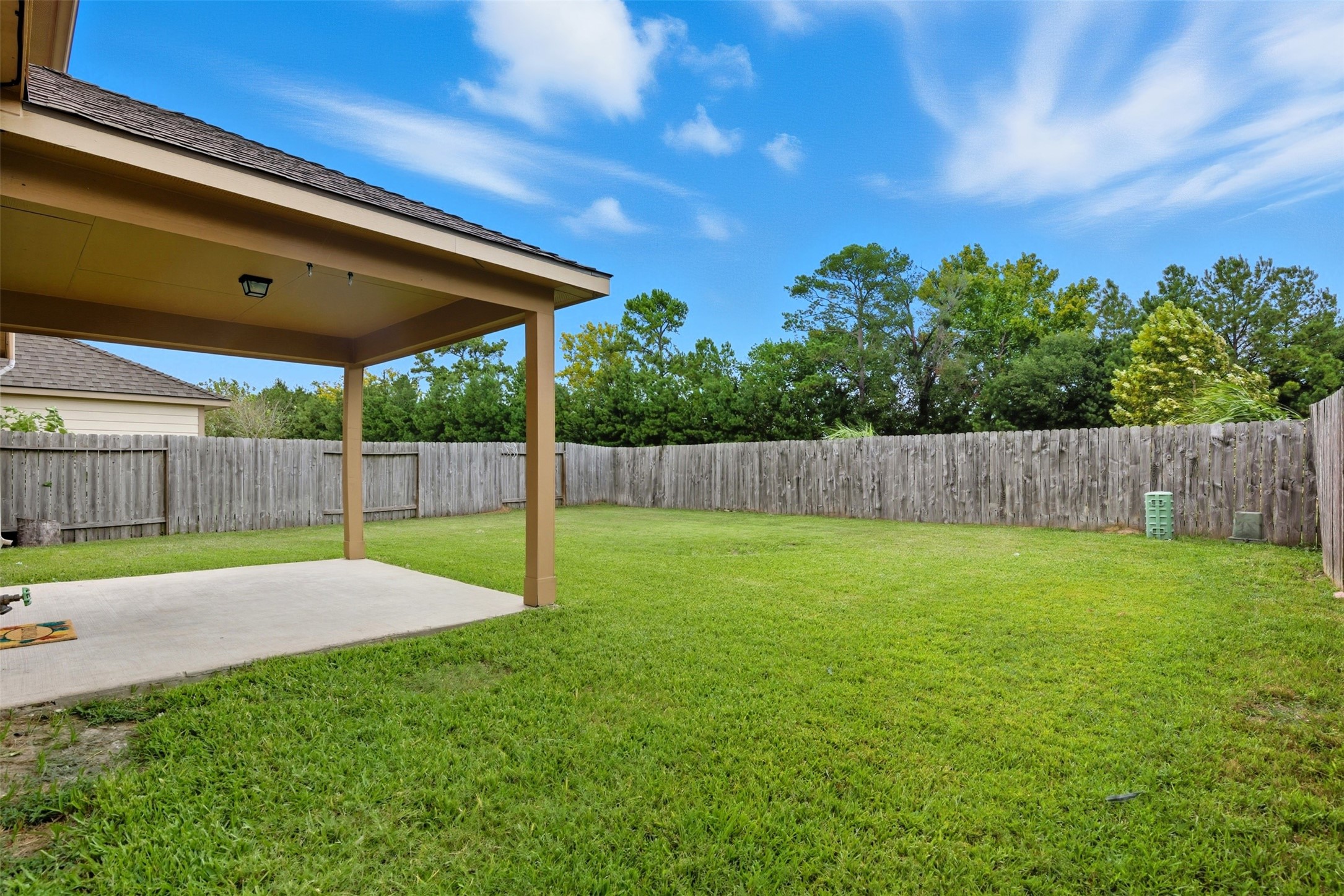 18414 West Hardy Road Houston, TX 77073 - Photo 36 of 46 a view of a backyard with a slide