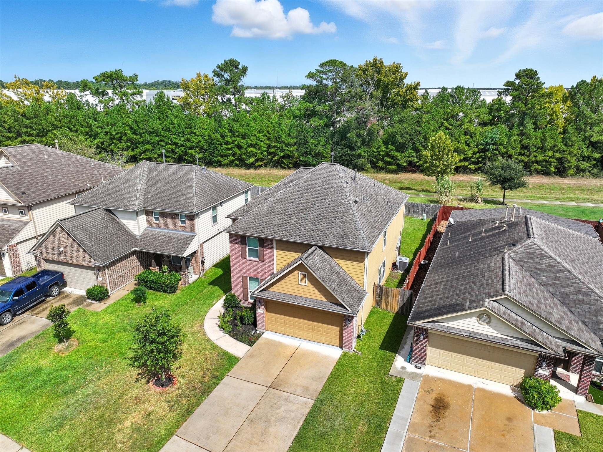 18414 West Hardy Road Houston, TX 77073 - Photo 38 of 46 an aerial view of a house with a yard and lake view