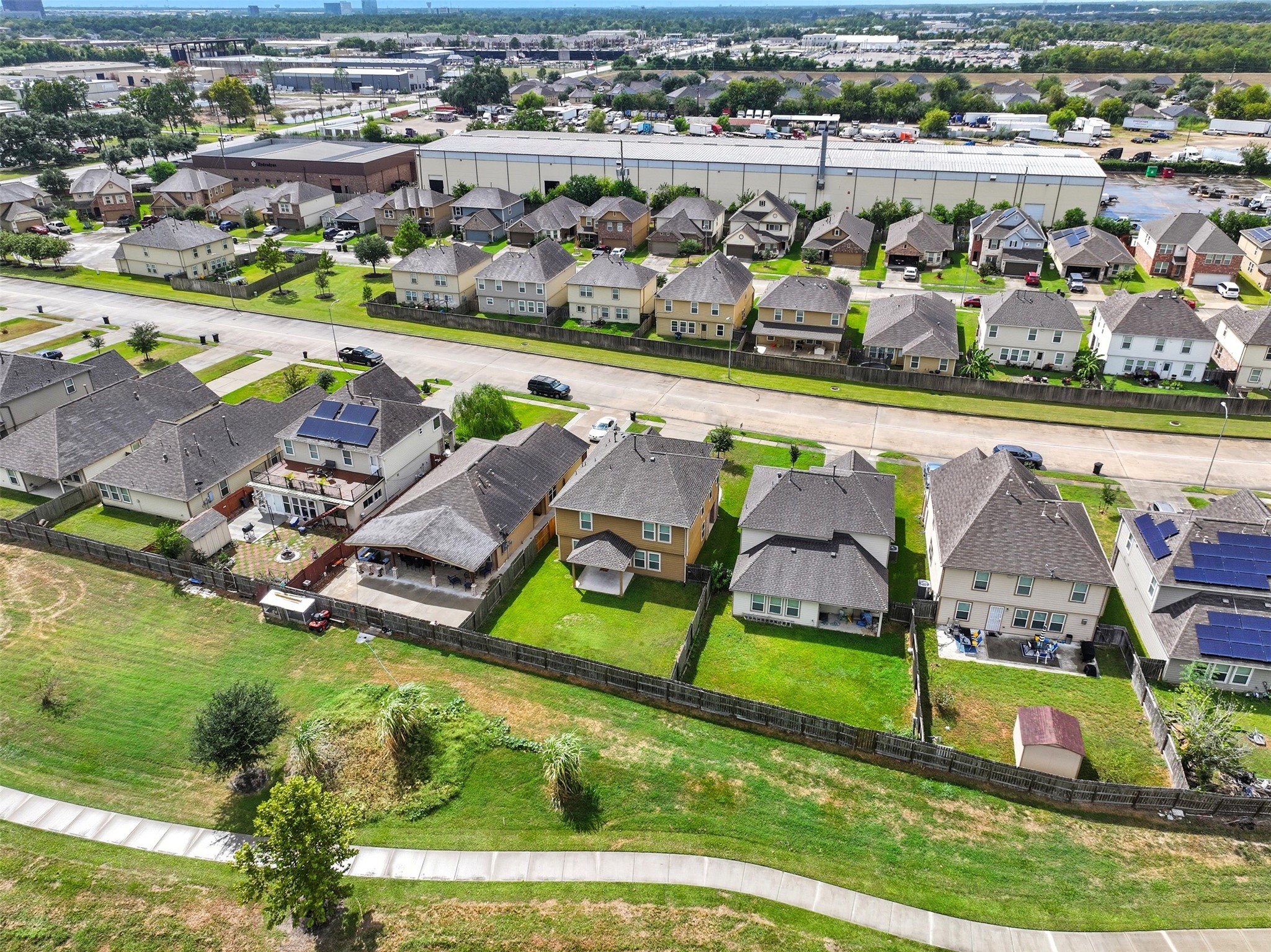 18414 West Hardy Road Houston, TX 77073 - Photo 41 of 46 an aerial view of a tennis ground and a cars park side of the road