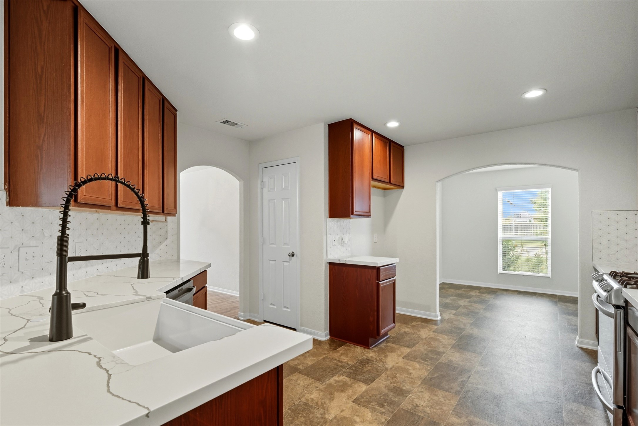 18414 West Hardy Road Houston, TX 77073 - Photo 6 of 46 a view of kitchen with furniture and large window