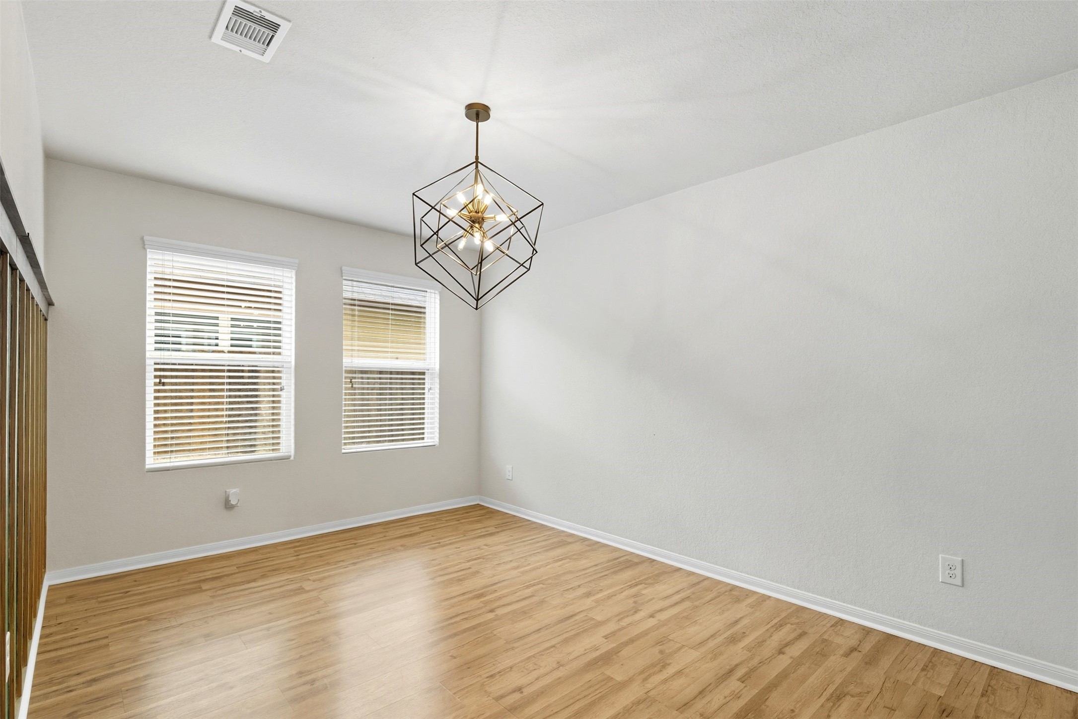 18414 West Hardy Road Houston, TX 77073 - Photo 10 of 46 a view of empty room with wooden floor