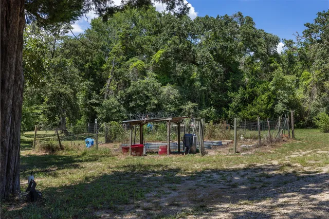 a view of a park with swings