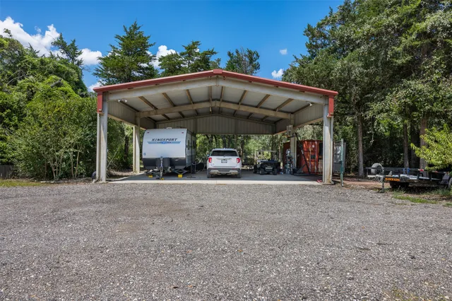 a view of a car parked in front of a house